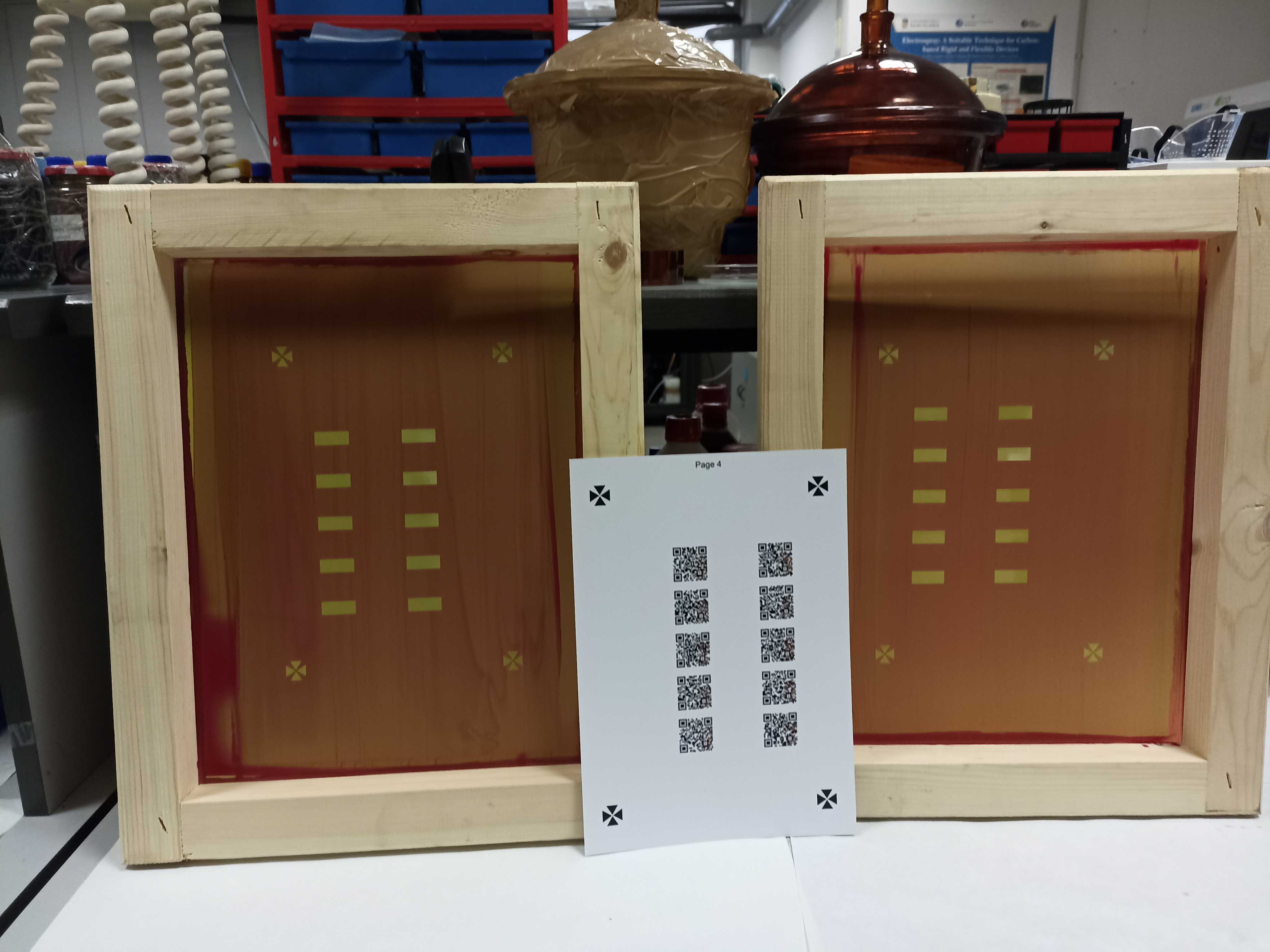Two screens and one substrate sheet. Each screen can print one color indicator, and both can be combined into the same pattern. The substrate has DINA4 measures, it also contains up to 10 Color QR Codes with an approximated size of 1 inch.