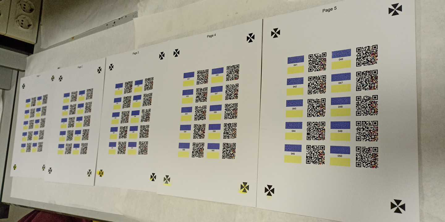 Several substrate sheets already printed. Each sheet contains up to 10 CO_2 sensors and 10 NH_3 sensors.